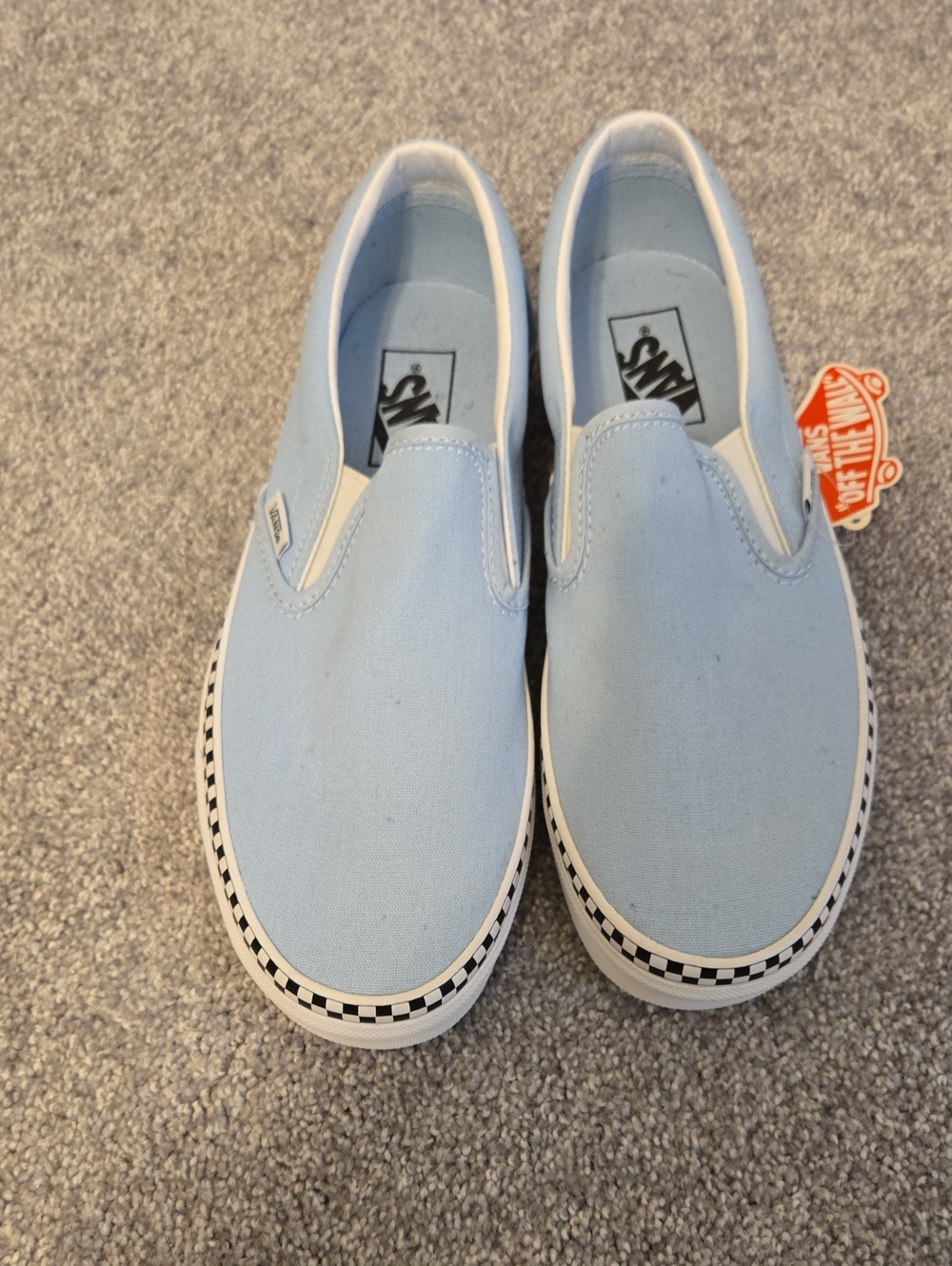 Vans Slip-On Sneakers in Sky Blue with Checkerboard Trim